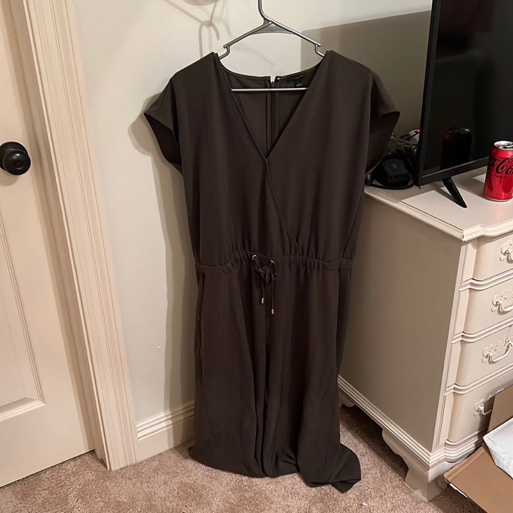 green jumpsuit